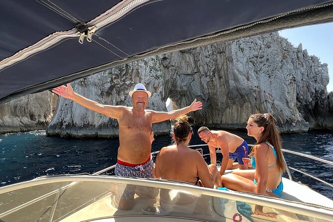 Capri and Blue Grotto Private Boat Tour - Explore Roman History at Spiaggia Bagni di Tiberio