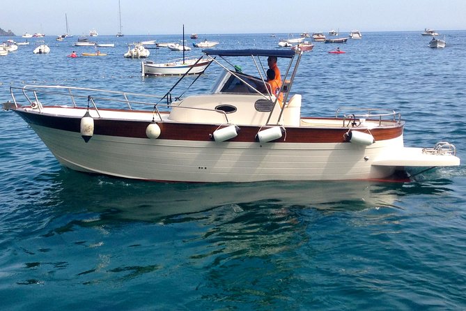 Capri & Blue Grotto Small Group Full-Day Boat Tour from Positano - The Itinerary: Grottos, Land Exploration, and Iconic Landmarks