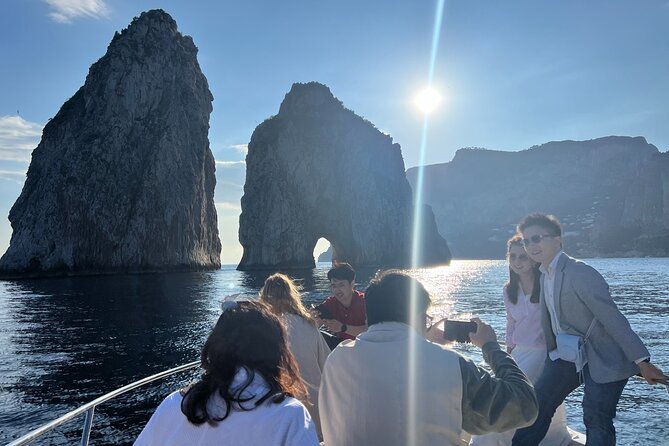 Capri Boat Tour and Blue Grotto Visit - Iconic Capri Landmarks: The Faraglioni and Casa Malaparte