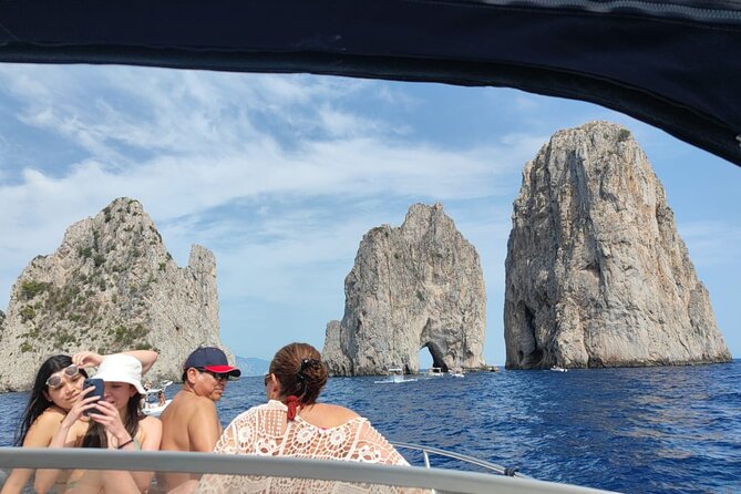 Capri Boat Tour and City Visit from Sorrento or Positano - The Legends and Art of Capri: Tiberius’ Leap and the Scugnizzo Statue