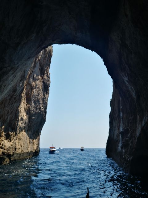 Capri: Boat tour around Capri with Faraglioni and grottos - Exploring Capri’s Iconic Grottos and Faraglioni