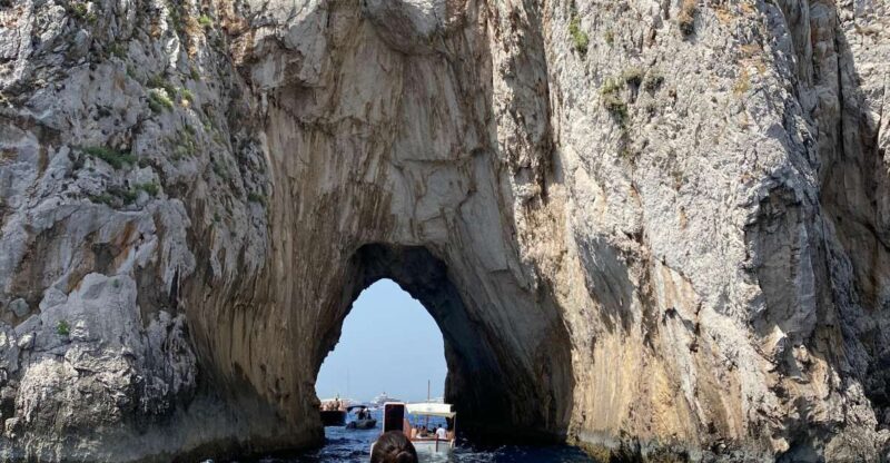 Capri: Boat tour around Capri with Faraglioni and grottos - The Onboard Aperitif and Lounge Experience