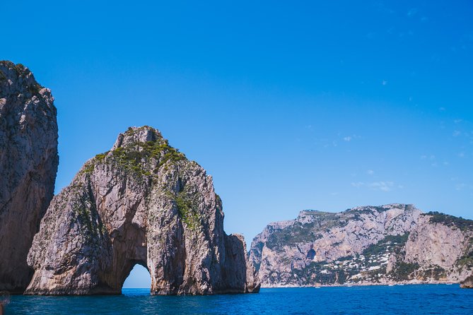 Capri Boat Tour: Grottoes, Swim & Sip Limoncello in a Small Group - The Route and Key Sightseeing Stops