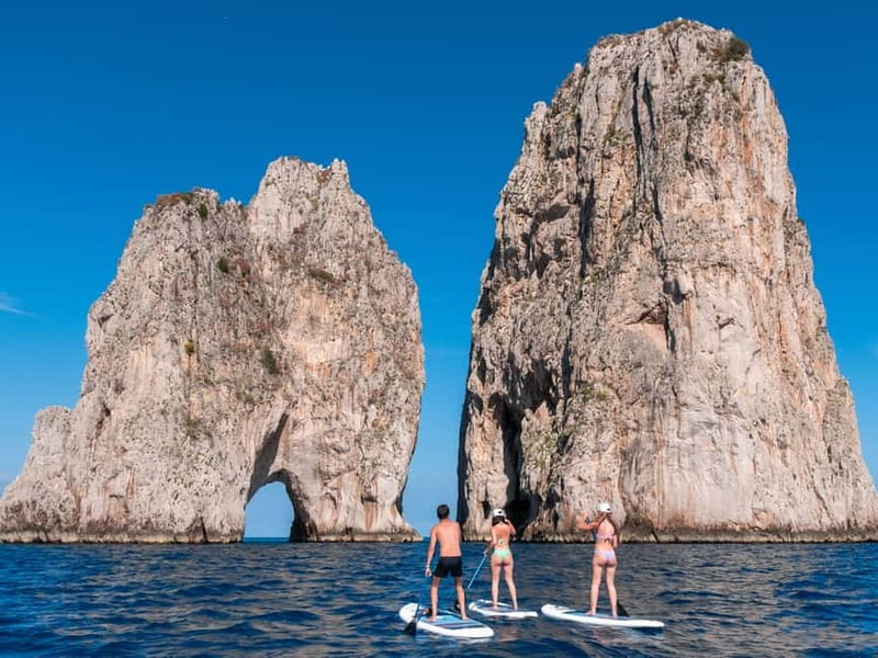 Capri: Caves and Beaches Paddle Board Tour. Photos included - Explore Capri’s Rocky Coastline on a Paddleboard Adventure