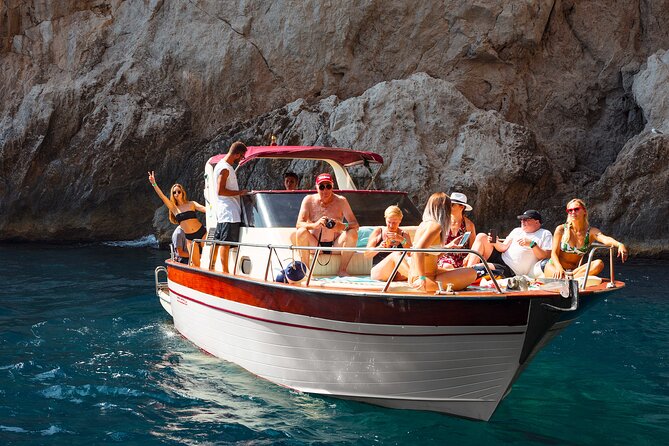 Capri Guided Boat Experience with Island Exploration and Transfer - The Scenic Route: Landmarks and Photo Stops