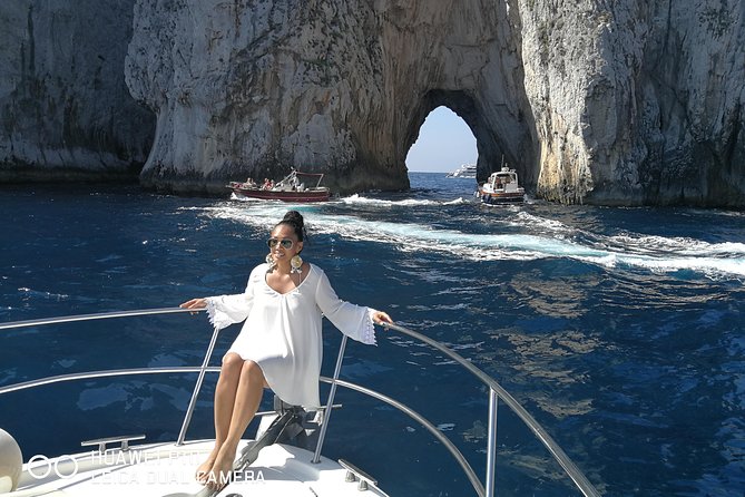 Capri luxury boat experience PLUS - Passing by Punta Carena Lighthouse and the Blue Grotto
