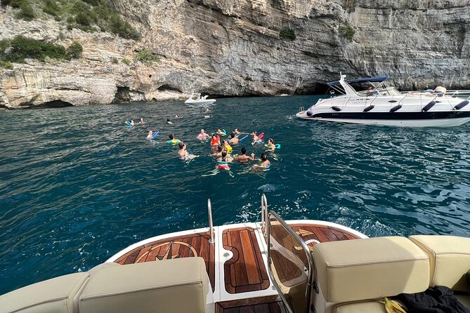 Capri Private all inclusive Boat Tour with City Exploration - Landmark Highlights: Casa Malaparte and the White and Red Grottos