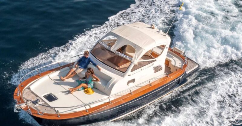 Capri private boat tour from sorrento on Gozzo 9 cabin - Marina Piccola and the Blue Grotto Experience