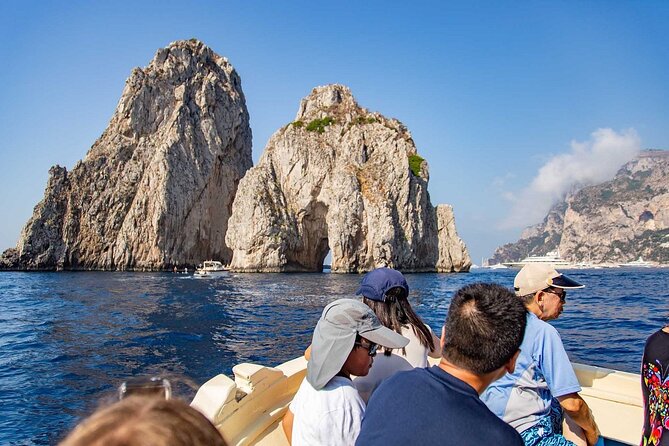Capri Small-Group Boat Tour from Sorrento with Lunch & Snorkeling - Tasting Homemade Food and Enjoying the Onboard Drinks