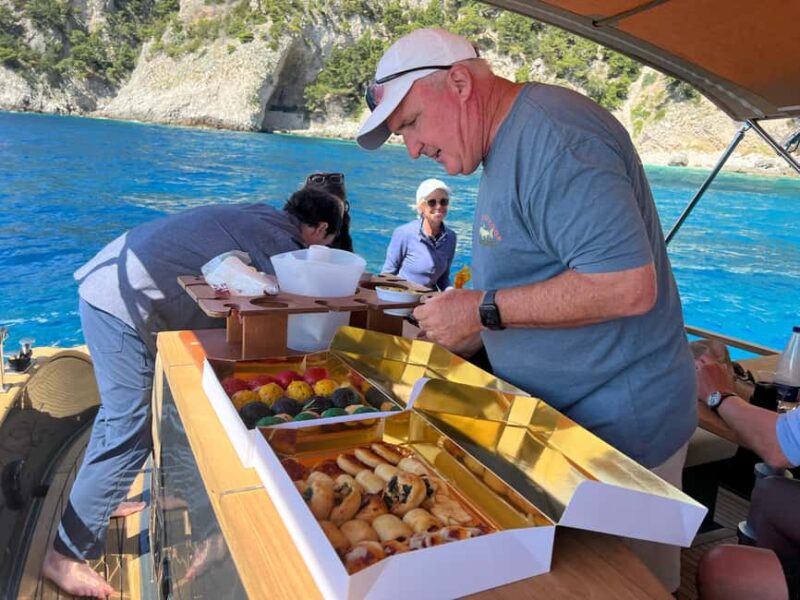 Capri: Yacht Cruise with Swimming, Brunch and City Visit - The Land Exploration and Free Time on Capri