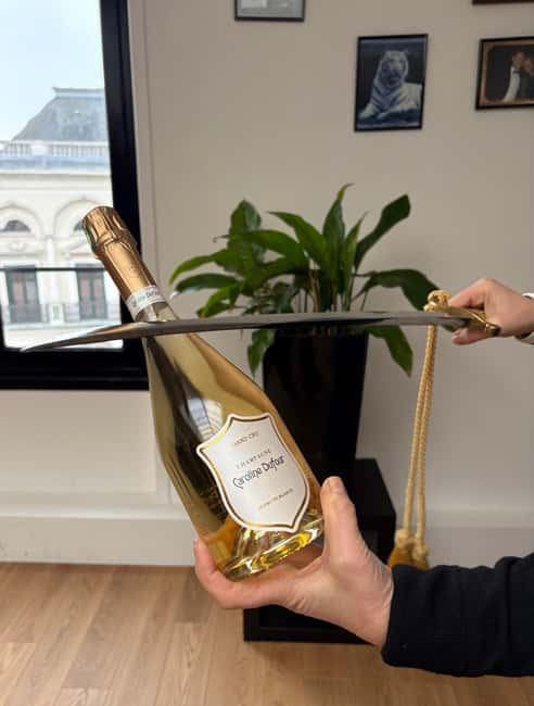 Caroline Dufour Champagne Sabrage in Reims - Cuvée Blanc de Blancs - Discover the Art of Champagne Sabering with Caroline Dufour in Reims