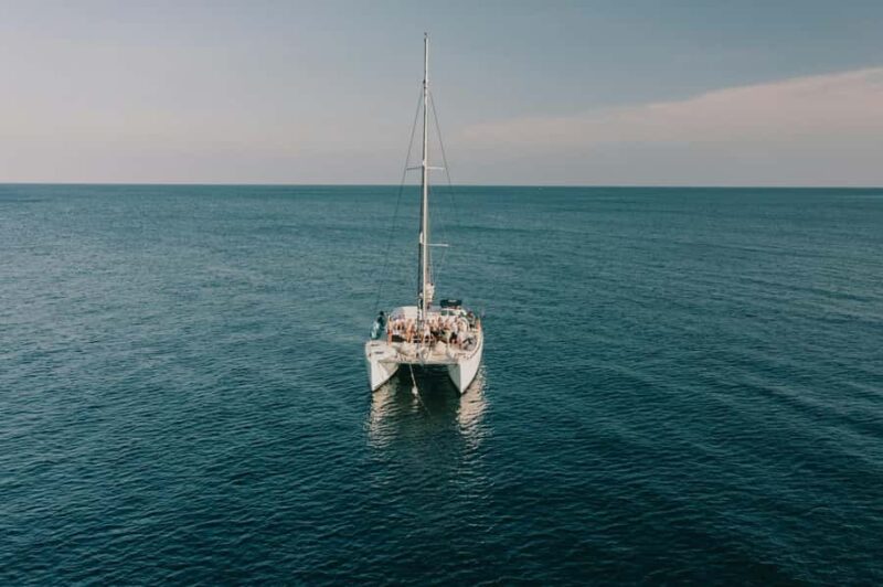 Catamaran Adventure to Isla Mujeres: Snorkeling, Food, and Transportation Included - Scenic Catamaran Ride Through the Mexican Caribbean