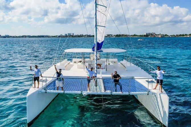 Catamaran Cruise from Costa Mujeres with Snorkeling and Lunch - Snorkeling and Fishing at the Coral Reef