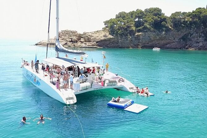 Catamaran departure in a young atmosphere - The Launch Location in Lloret de Mar