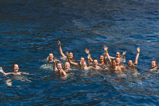 Catamaran departure in a young atmosphere - Food, Drinks, and Music on Board