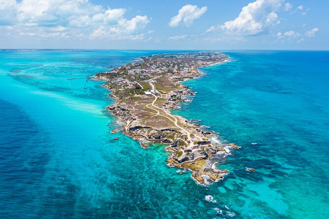 Catamaran Isla Mujeres Tour with Hotel Pick Up included - Practical Details: Booking, Fees, and Cancellation