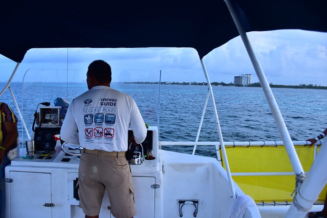 Catamaran Isla mujeres Unlimited with Transfer from Playa del Carmen - Snorkeling in the Shallow Reef with Artistic Sculptures