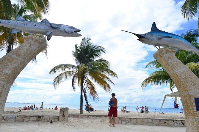Catamaran Party on the Caribbean Sea to Isla Mujeres - Snorkeling in Calm, Clear Waters Near Isla Mujeres
