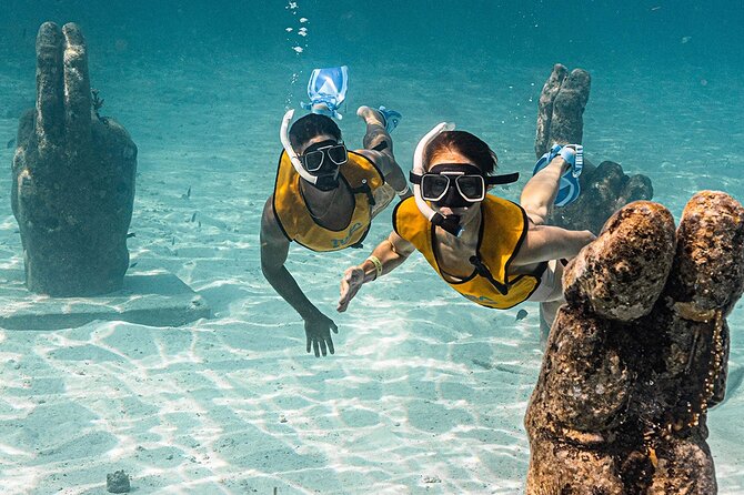 Catamaran Plus Reef Snorkeling and Isla Mujeres Visit - Isla Mujeres Free Time for Exploration and Shopping