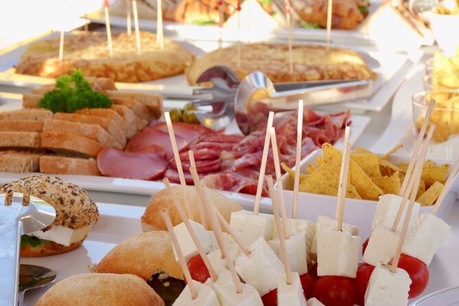 Catamaran sailing at sunset with tapas Palma de Mallorca - Experience a Relaxing Sunset Catamaran Cruise in Mallorca for $91.39