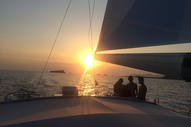 Catamaran sailing at sunset with tapas Palma de Mallorca - Sails Past Palma’s Iconic Landmarks