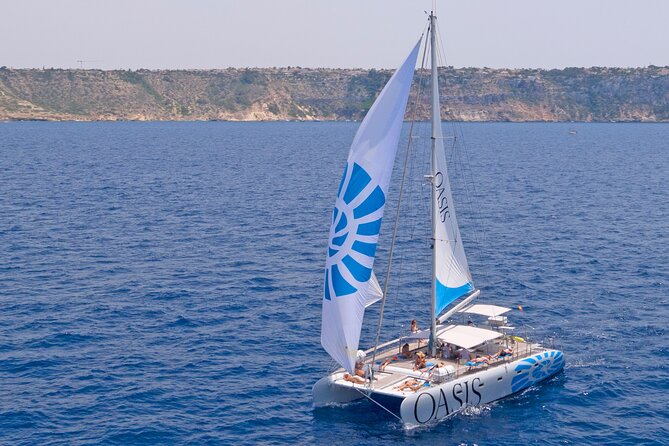 Catamaran sailing at sunset with tapas Palma de Mallorca - Onboard Activities and Amenities