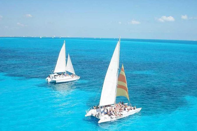 Catamaran Sailing Experience & Snorkeling Tour to Isla Mujeres - Key Points