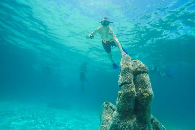 Catamaran Sailing & Snorkeling Experience Isla Mujeres from Playa Del Carmen - Exploring Isla Mujeres: Punta Sur, Playa Norte, and Calle Hidalgo