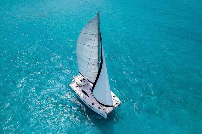 Catamaran Snorkeling and Lunch Tour to Isla Mujeres Included - Return Journey to Marina Puerto Cancun