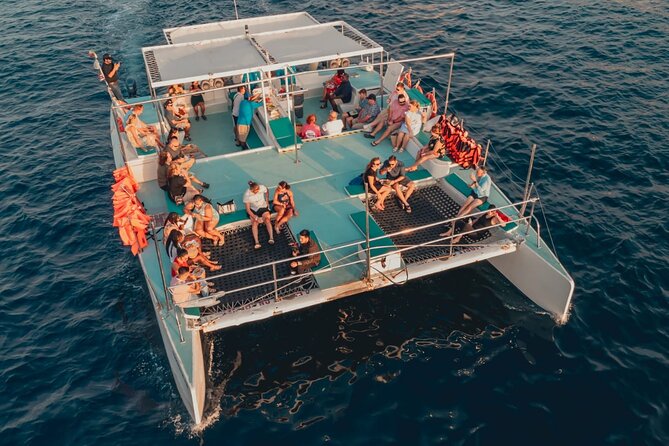 Catamaran Sunset Cruise with Open Bar in Cabo San Lucas - Key Points