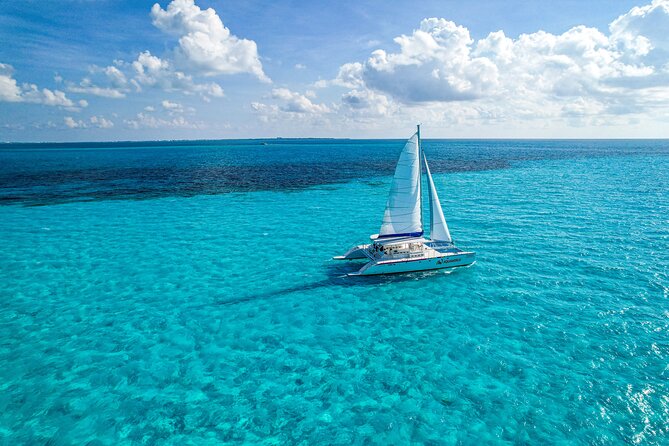 Catamaran to Isla Mujeres with Open Bar from Playa del Carmen - Cruising on a Catamaran through Caribbean Waters