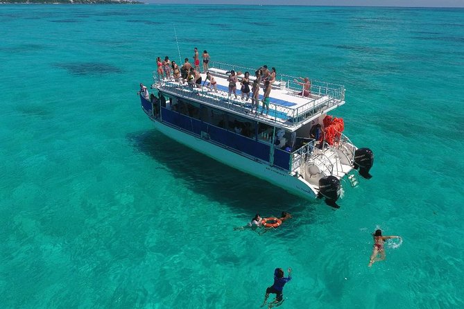 Catamaran Tour to Isla Mujeres all Included - Drinks and Entertainment Aboard the Modern Catamaran
