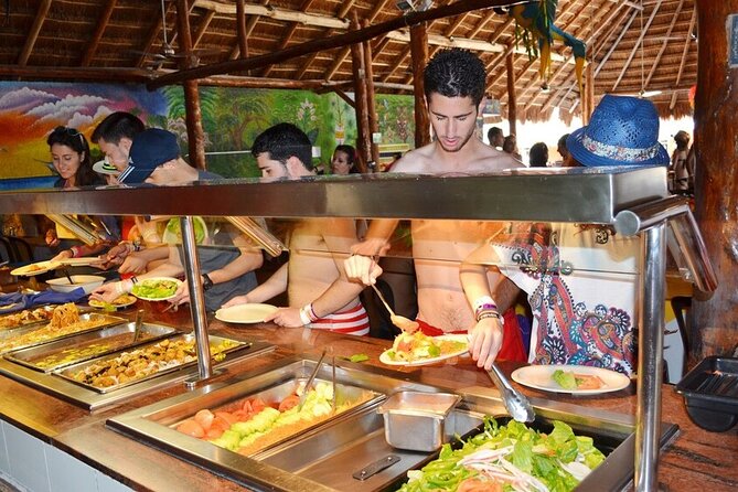 Catamaran Tour to Isla Mujeres from Cancún with Bar and Lunch - Relaxing at the Isla Mujeres Beach Club