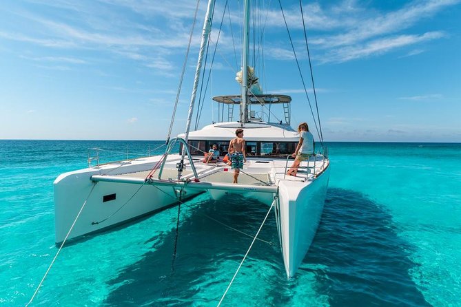 Catamaran Tour to Isla Mujeres, Open bar, Lunch, Snorkeling, Beach Club Included - Sailing Through the Caribbean to Isla Mujeres