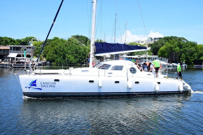 Catamaran Tour to Isla Mujeres, Open bar, Lunch, Snorkeling, Beach Club Included - Practical Details and Tips for Booking