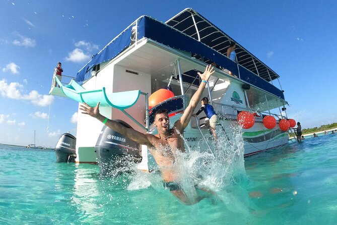 Catamaran with Slide in Cozumel Reef Snorkeling Experience - Exciting Cozumel Catamaran Snorkeling with Water Slide for $100