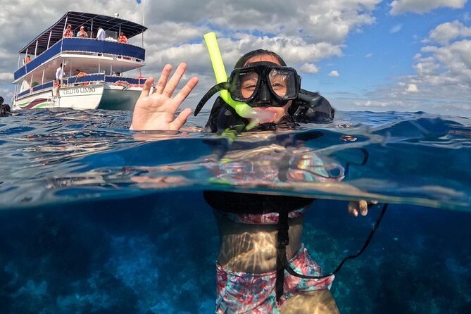 Catamaran with Slide in Cozumel Reef Snorkeling Experience - The Water Slide and Onboard Festivities