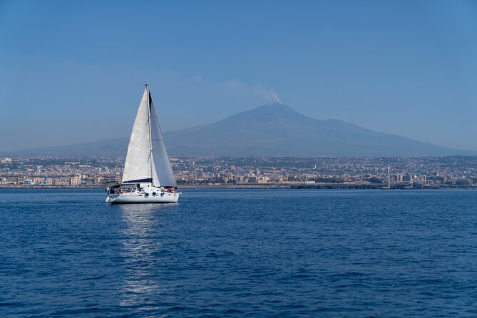 Catania boat tour along the coast with aperitif and snorkeling - Experience a Scenic Catania Coastline with Snorkeling and Aperitif