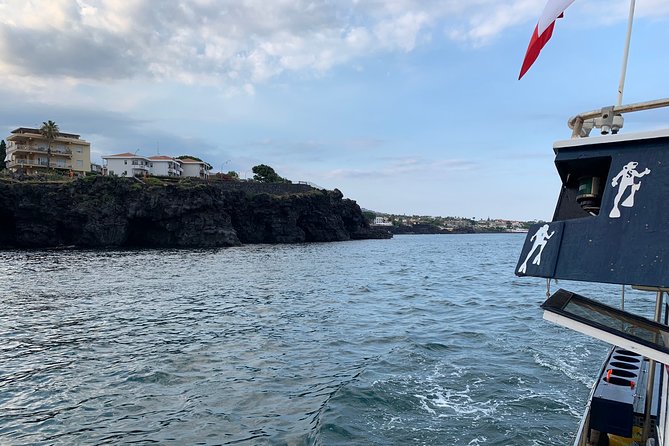 Catania: Cyclops Islands & Timpa Nature Reserve Boat Tour - Snorkeling at Isola dei Ciclopi: Exploring Underwater Volcanic Landscapes