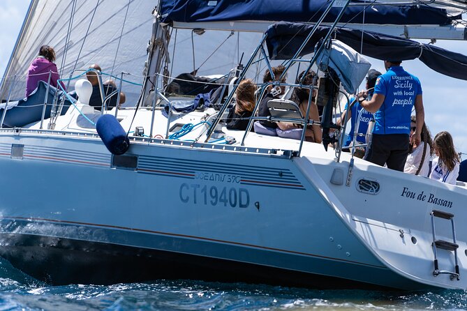 Catania: Sail Cyclops Coast by Boat and Enjoy a Sicilian Aperitif - Activities and Equipment Included on the Tour