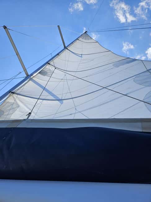 Catania: Sailing Boat Tour with Brunch and Swimming Stop (4h) - Scenic Stops at Ulysses Caves and Aci Castello