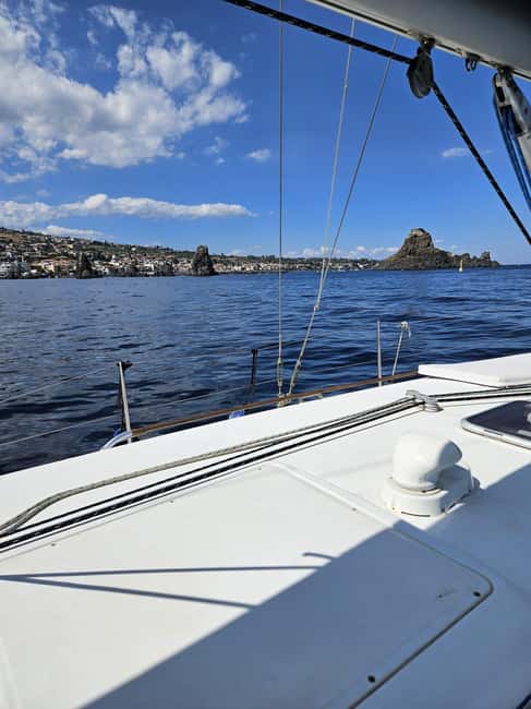 Catania: Sailing Boat Tour with Brunch and Swimming Stop (4h) - Exploring the Riviera dei Ciclopi and the Ulysses Caves