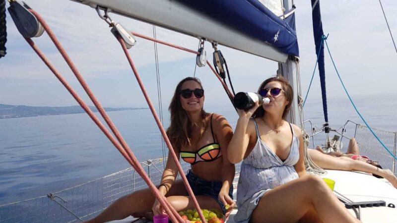 Catania: Spritz and Sunset Sailing Tour - Visiting Aci Trezza for Aperitif and Local Snacks