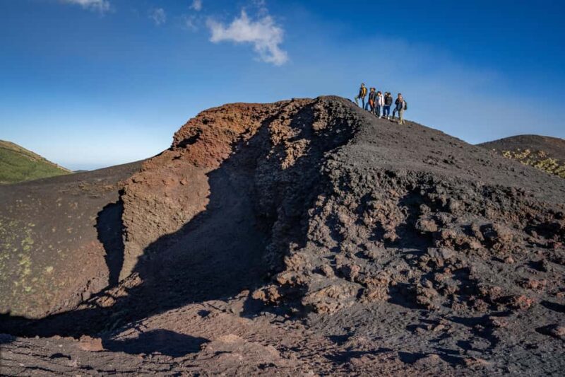 Catania: Stunning Etna Sunset Tour with Pickup and Drop-Off - Visiting a Volcanic Cave: Educational and Fascinating