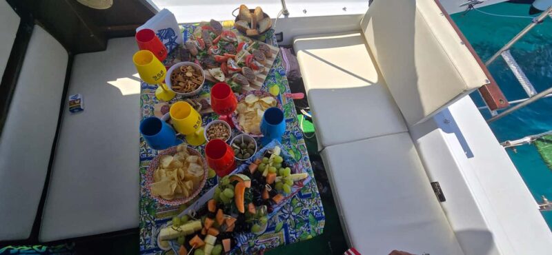 Cefalù: Coast-to-coast boat day trip with snorkeling and aperitif - Snacks, Drinks, and Aperitifs Aboard