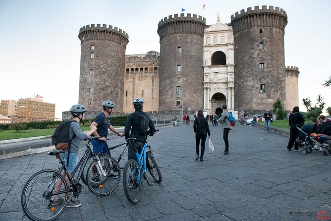Central Naples Bike Tour - Walking Through the Palazzo Reale and Church of Gesu Nuovo