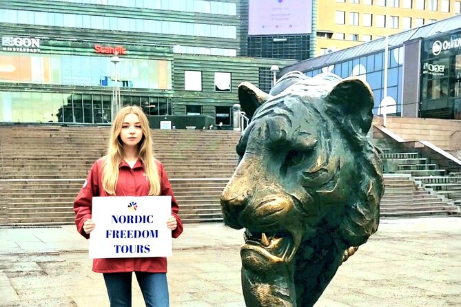 Central Oslo Guided Walking Tour - Exploring Oslos Iconic Tiger Sculpture