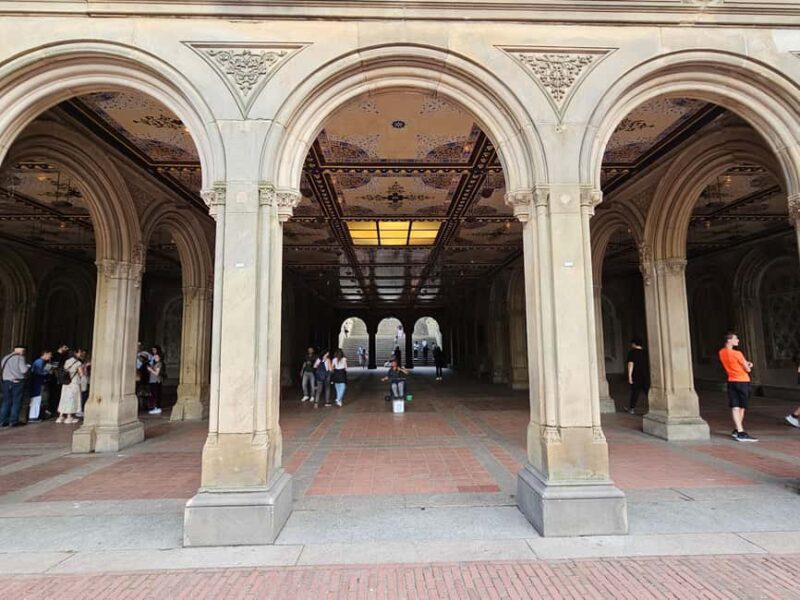Central Park, NY: Nature, Architecture and Movie Scenes Tour - Crossing the Victorian-Style Cast-Iron Bridge Over Central Park Lake