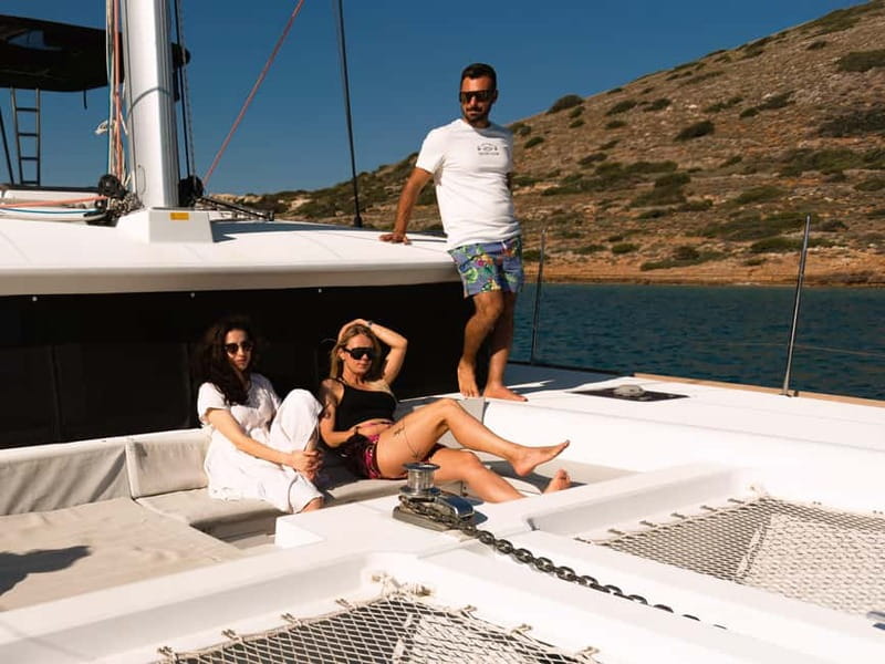 Chania Old Port: Luxury Sunset Catamaran Cruise with Wine - Activities at Agioi Theodoroi: Swim, Snorkel, and Pose for Pictures