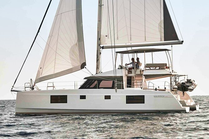 Chania: Private Day Catamaran Cruise with Swimming and Meal - Key Points